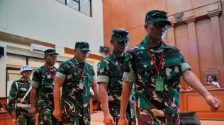 julius-ibrani-proses-hukum-4-anggota-bais-tni-di-peradilan-militer-bertentangan-dengan-konstitusi