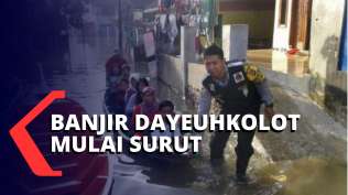 banjir-mulai-surut-warga-bandung-mulai-membersihkan-rumah
