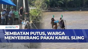 Jembatan Terputus Akibat Banjir Bandang, Warga Terpaksa Seberangi Sungai Dengan Kabel Sling